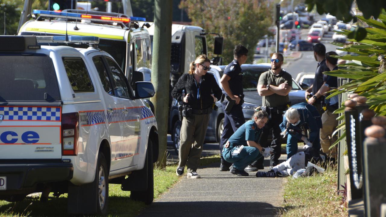 Shanon Leath Washington is treated by paramedics after his dramatic arrest following a dangerous pursuit through Toowoomba’s CBD. Picture: Rhylea Millar