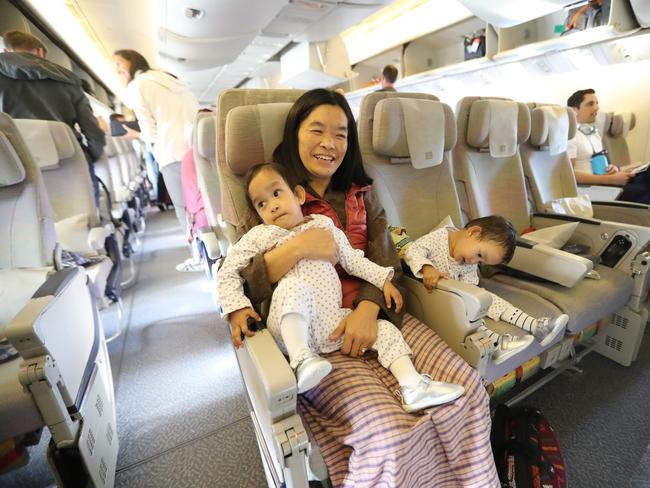 Nima and Dawa Pelden leave Melbourne for home in Bhutan with mum Bhumchu after the successful separation surgery. Picture: Alex Coppel