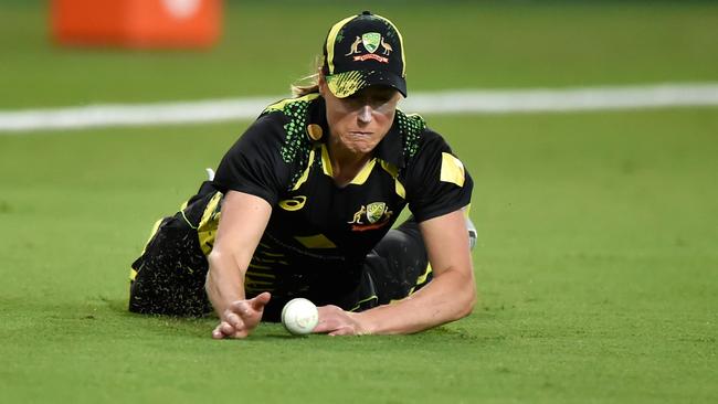 Ellyse Perry at full stretch in the field against India. Picture: Matt Roberts/Getty Images