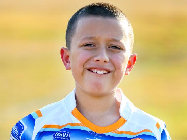 10 year old Jeremiah Burgess poses for photographs at Peter Van Hasselt Park. Shalvey, Saturday, May 26th 2018. The TryTime team is a team for players with disabilities - and is growing with memberships. (AAP Image / Angelo Velardo)