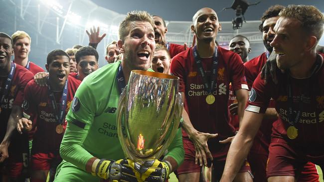 ISTANBUL, TURKEY - AUGUST 14: Adrian of Liverpool lifts the UEFA Super Cup trophy as Liverpool celebrates victory following the UEFA Super Cup match between Liverpool and Chelsea at Vodafone Park on August 14, 2019 in Istanbul, Turkey. (Photo by Michael Regan/Getty Images) (Photo by Michael Regan/Getty Images) *** BESTPIX ***