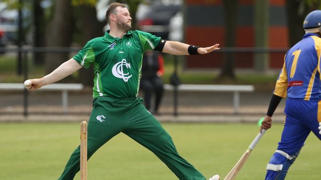 Tom McQuinn bowling for Croydon. Picture: Stuart Milligan