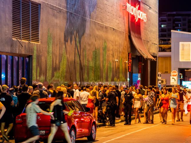 Mitchell St in Darwin was abuzz to celebrate the end of 2020. There was a visible police presence along the party strip.   Picture: Che Chorley