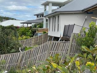 Riverstone Crossing on the Gold Coast - backyard fences falling apart after a landslip.