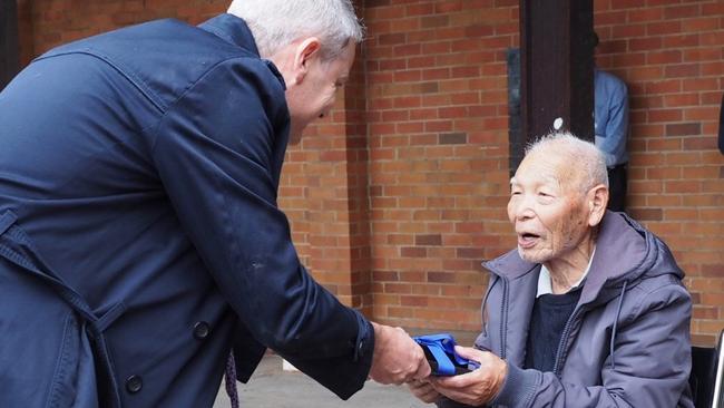 Teruo Murakami, the last survivor of the Cowra breakout, with Cr James Mackay at Witton Barracks.