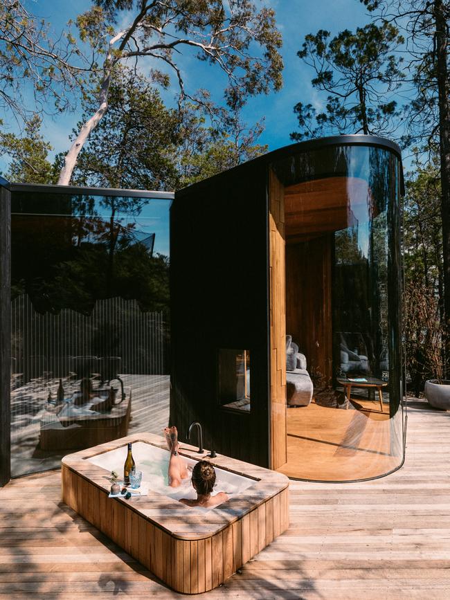 Relaxing in the outdoor bath, surrounded by trees, at Freycinet Lodge Coastal Pavilions. Picture: Melissa Findley