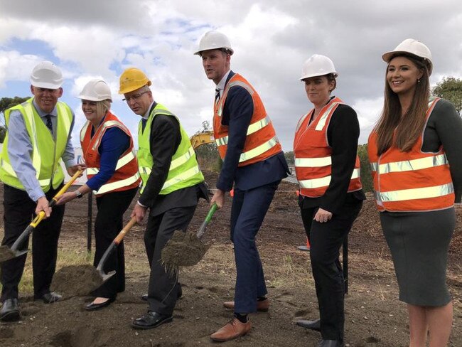 State Transport Minister Mark Bailey turns the first sod on the upgrade of the M1. Picture: Andrew Potts