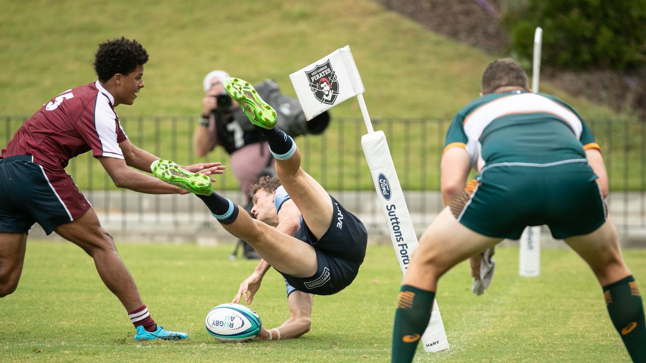 What a try! Jay McKenzie scoring in the corner. Pictures: Julian Andrews