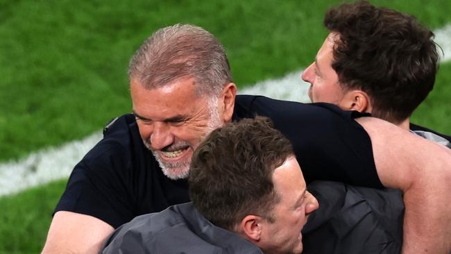 BILBAO, SPAIN - MAY 21: Ange Postecoglou, Manager of Tottenham Hotspur, celebrates his teams first goal scored by Brennan Johnson (not pictured) with his coaching staff during the UEFA Europa League Final 2025 between Tottenham Hotspur and Manchester United at Estadio de San Mames on May 21, 2025 in Bilbao, Spain. (Photo by Carl Recine/Getty Images)