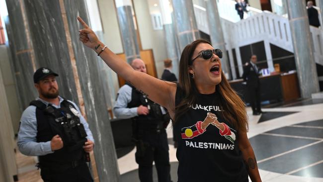 Independent Senator Lidia Thorpe protests inside the Marble Foyer at Parliament House in Canberra on Thursday.