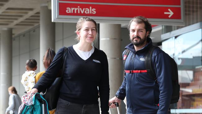 Monique Hamilton and Ben Borscht are relieved to have made it back to Brisbane Airport from Melbourne before the lockdown. Picture: Liam Kidston