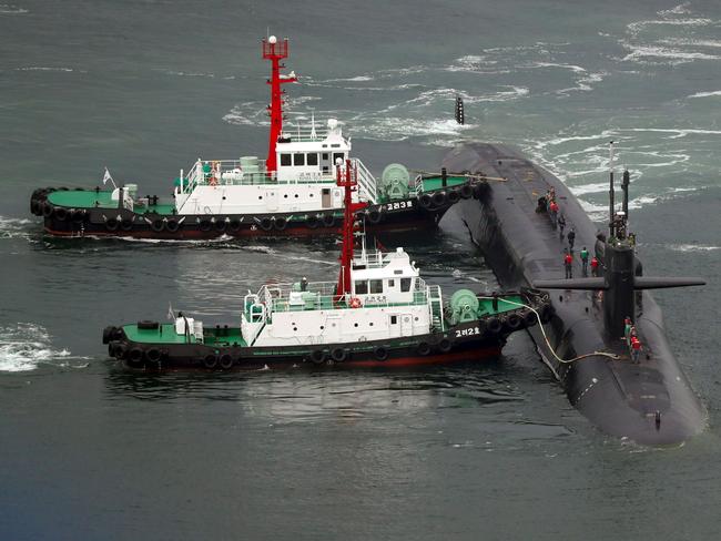 Nuclear-powered submarine USS Michigan approaches at the southeastern port city of Busan on Tuesday. Picture: AFP/Yonhap