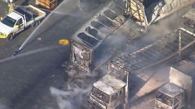 Multiple trucks destroyed in Yatala fire (source 9 News)