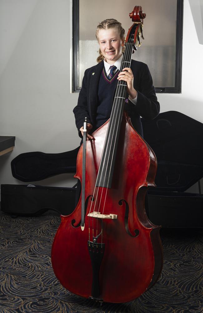 Adelaide Graham of The Glennie School with her double-bass before competing in the All-Age graded string solo grade two section of the 78th City of Toowoomba Eisteddfod at The Empire, Friday, July 26, 2024. Picture: Kevin Farmer