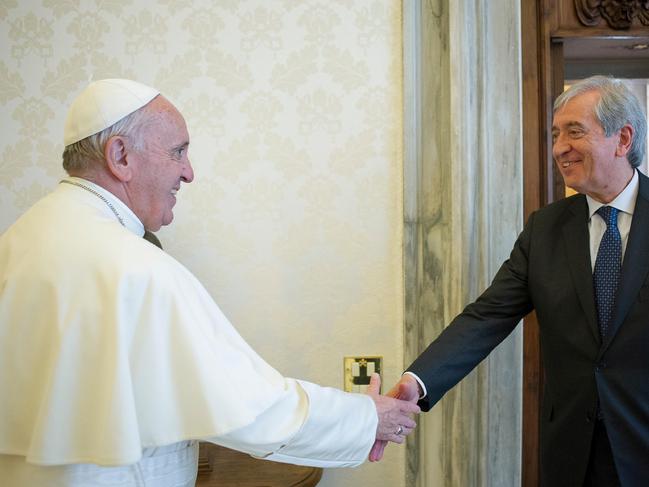 Pope Francis is greeted by Libero Milone (R), the Vatican's auditor general, during a meeting at the Vatican, April 1, 2016. Picture taken April 1 2016. Osservatore Romano/Handout via REUTERS  ATTENTION EDITORS - THIS IMAGE WAS PROVIDED BY A THIRD PARTY. NO RESALES. - RC17E45F3670