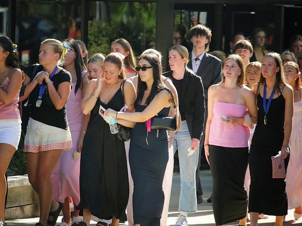 Many dressed in pink and white as a tribute to the young teen. Picture: NewsWire / Luis Enrique Ascui