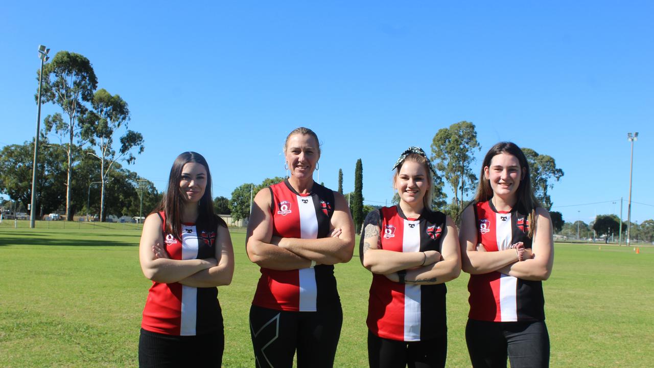 Captain Reanna Fenton, women's coach Sandy Banks and vice-captain Teagan Cutts and Hayley Saunders. Photo: Laura Blackmore