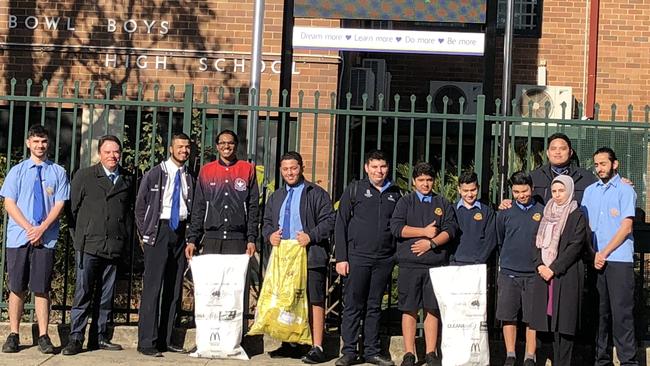 #DOSOMETHING DAY: Punchbowl Boys High School principal ROBERT PATRUNO with students and staff Mariam Sabih (science teacher) and Francis Francis Floresca (english teacher) Picture: Lawrence Machado