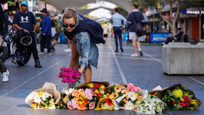 Residents from eastern Sydney placed floral tributes on Sunday following the devastating incident that left seven dead, including the attacker. Picture: NCA NewsWire / David Swift