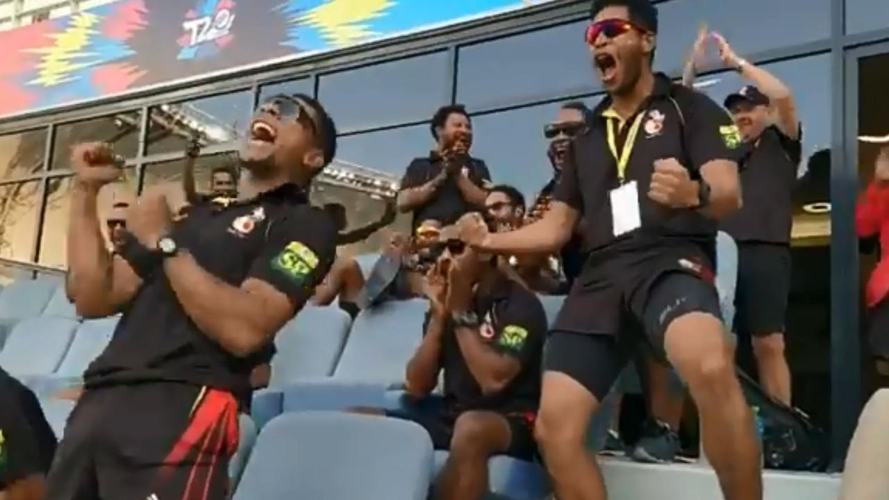 Papua New Guinea players celebrate qualifying for the Twenty20 World Cup final.