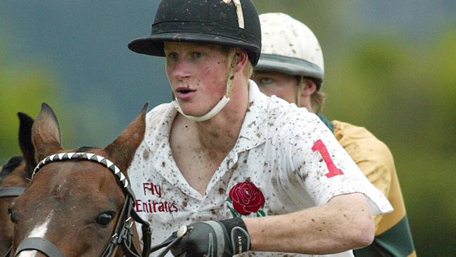 Prince Harry playing in Young England vs Young Australia polo match in NSW 23 Nov 2003. british royalty henry