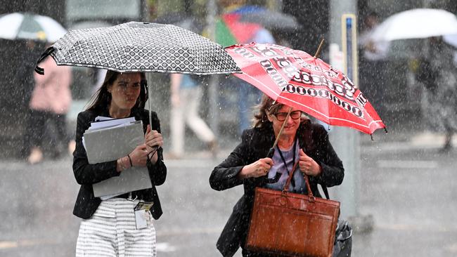 While the sun may come out on the weekend, those in Queensland and NSW are being warned to pack their umbrellas on Friday and next week. Picture: NCA NewsWire / Dan Peled