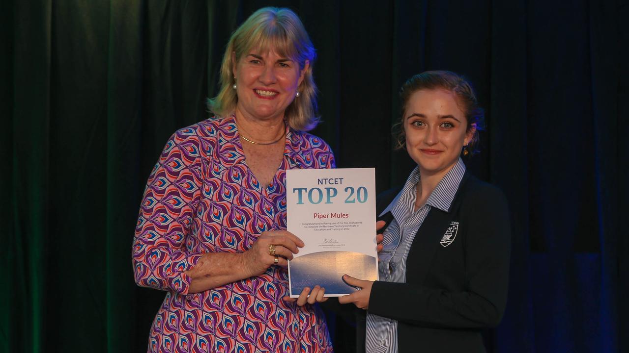 Education Minister Eva Lawler presents Essington School's Piper Mules after the announcement of 2022 NTCET Top 20 Year 12 Students and 2022 Top Aboriginal Student at NT Parliament House. Picture: Glenn Campbell