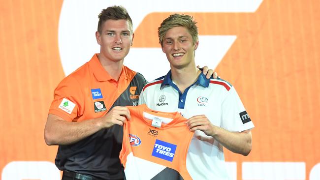 Jackson Hately (right) is pressing for a senior debut with GWS Giants. Picture: AAP Image/James Ross. 