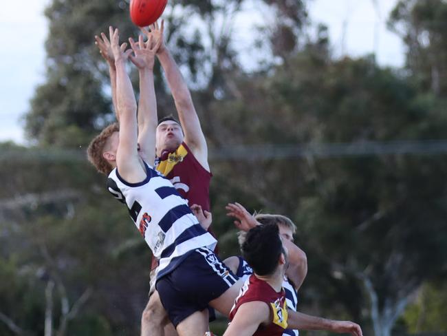 Cruiz West gets up high for Pearcedale. Picture: Doug Farr