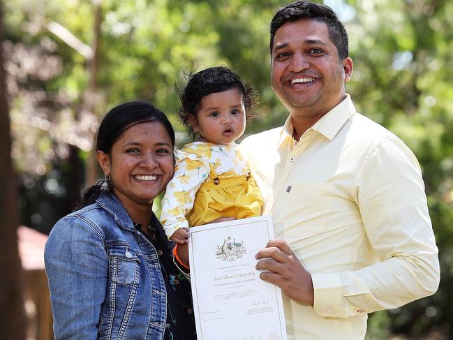 Shishira Mallasandra, his wife Manasa and daughter Mishika after becoming an Australian citizen on Tuesday. Picture: Tim Hunter