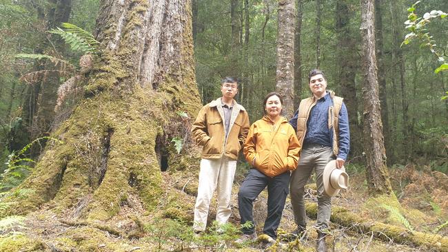 Anti-CCP campaigners Max Mok, left, Kyinzom Dhongdue and Drew Pavlou on the mining lease in Tasmania’s west.