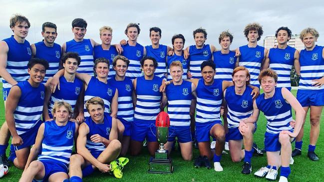 St Peter’s College football team celebrates after beating Melbourne Grammar. Picture: Glen Malkin