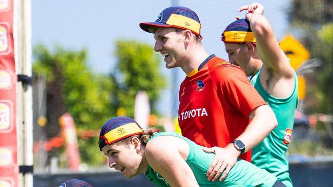 Crow Andrew McPherson (centre) has become the AFL's youngest coach in 2024. Picture: Adelaide Football Club/Laura Chigwidden