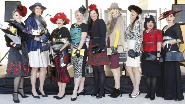 Finalists in the lady of the carnival fashion stakes on South Grafton Cup day line up after the judging. Photo Adam Hourigan / The Daily Examiner