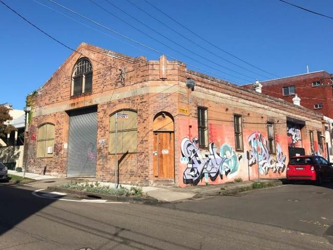 The building, on the corner of Australia and Eton Sts, before it caught fire.