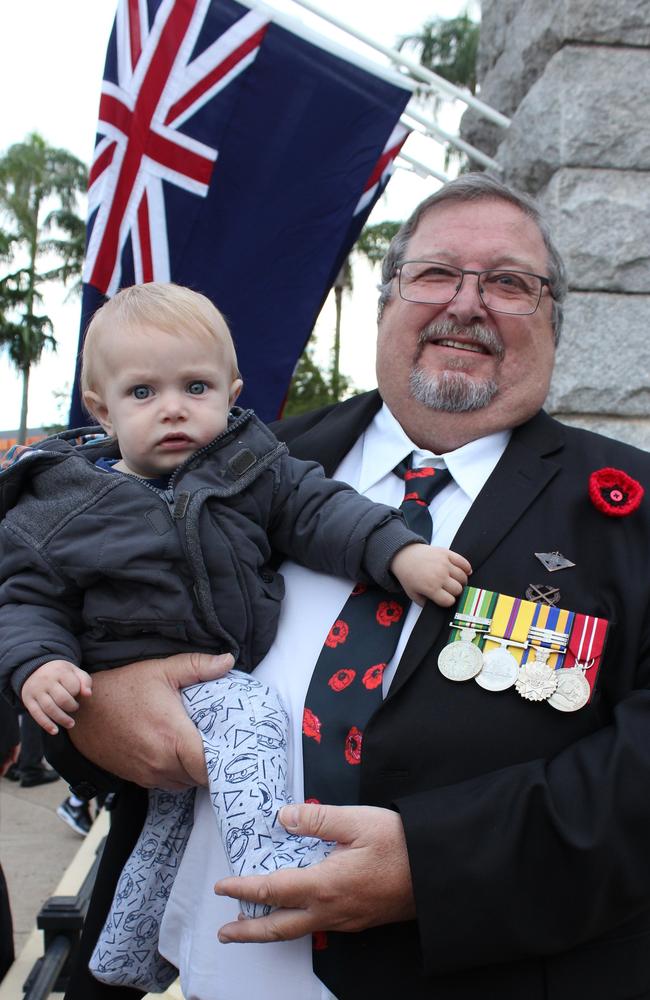 Peter Spencer of Bracken Ridge with grandson Theodore Kusters of Nundah at the Sandgate Dawn Service. Peter served in Iraq in 2008-09 with a battle group encompassing the 2/14th and 6RAR. Picture: Michelle Smith