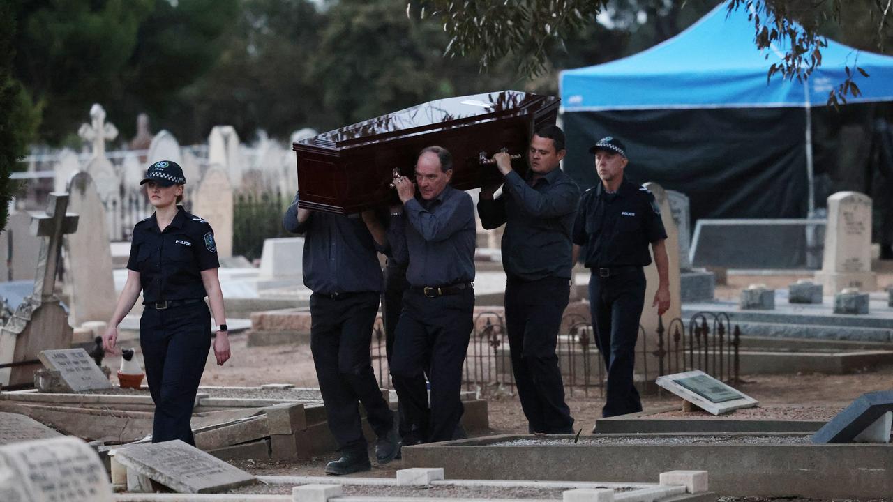 Adelaide Cemetery Authority Pallbearers carry the remains of the Somerton Man at West Terrace Cemetery. Picture: NCA NewsWire / David Mariuz