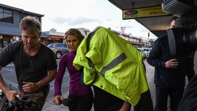 The man allegedly involved in the fatal crash in Bossley Park this morning leaving Fairfield police station. Picture: Flavio Brancaleone