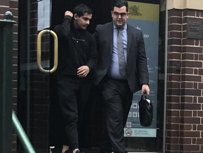 Ali Reza Bahrami (left), 20, of Auburn, leaving Manly Courthouse on Wednesday, where he pleaded guilty to four cocaine supply charges. Picture: Manly Daily