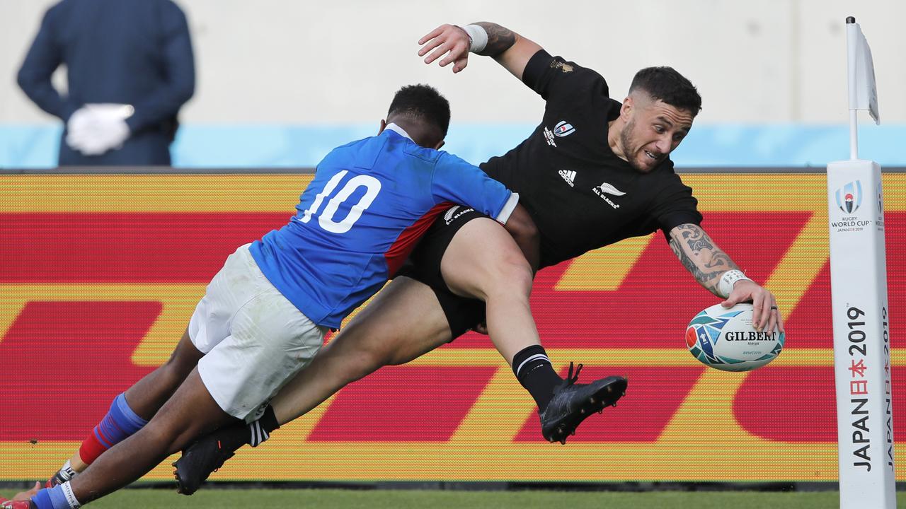 New Zealand’s TJ Perenara scores a try during the Rugby World Cup in Tokyo.