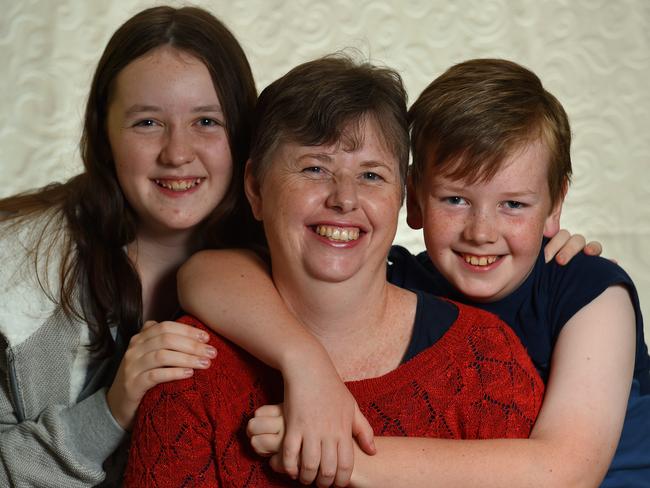 Katherine Henry and children Grace (14) and James (11). Kate is on a clinical trial for the high cost lifesaving cancer drug palbociclib that is expected to be approved for a government subsidy. Picture: Josie Hayden