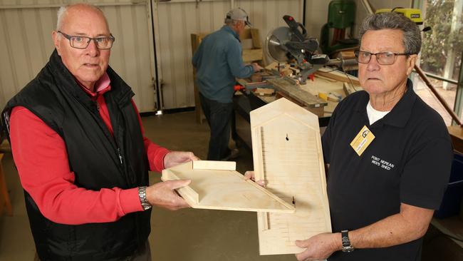 Point Nepean Men's Shed members Marshall Rigbye (L) and Paddy Downes with their microbat nesting boxes.