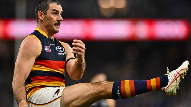 Taylor Walker boots one of his nine goals against the Eagles. Picture: Daniel Carson/AFL Photos via Getty Images.