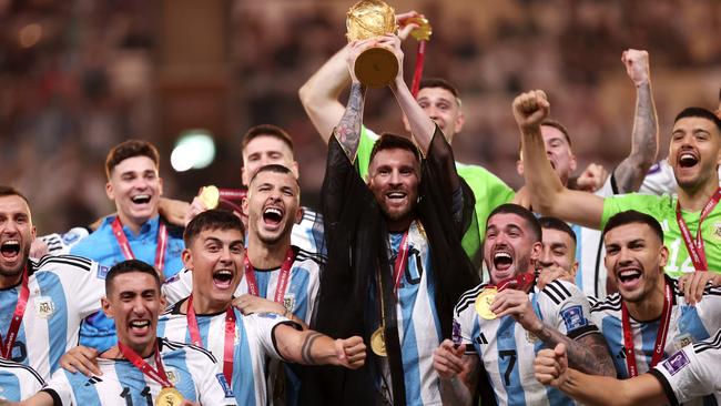 Lionel Messi of Argentina lifts the FIFA World Cup Qatar 2022 Winner's Trophy