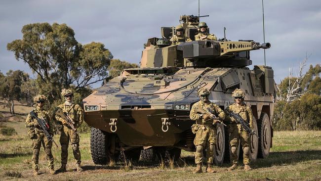 An Australian Army Boxer combat reconnaissance vehicle crewed. None of the army’s new armoured vehicles are equipped with counter-drone systems. Picture: Defence