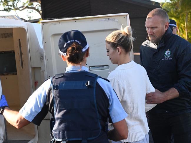 Griffiths is put in a police wagon. Picture: Jeremy Piper