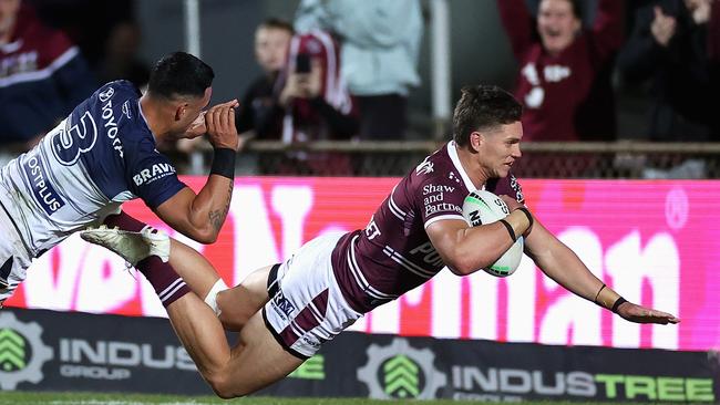 SYDNEY, AUSTRALIA – JUNE 17: Reuben Garrick of the Sea Eagles scores a try during the round 15 NRL match between the Manly Sea Eagles and the North Queensland Cowboys at 4 Pines Park, on June 17, 2022, in Sydney, Australia. (Photo by Cameron Spencer/Getty Images)