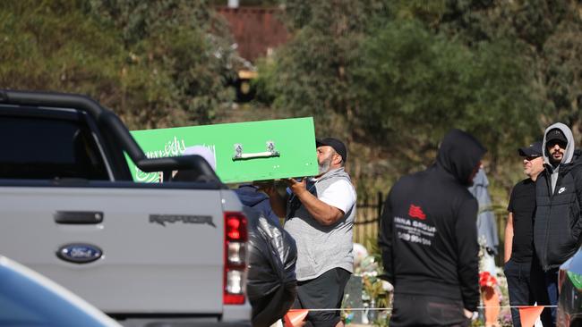 Rami Iskander’s coffin being carried to the burial plot at Rookwood Cemetery in May, 2022.