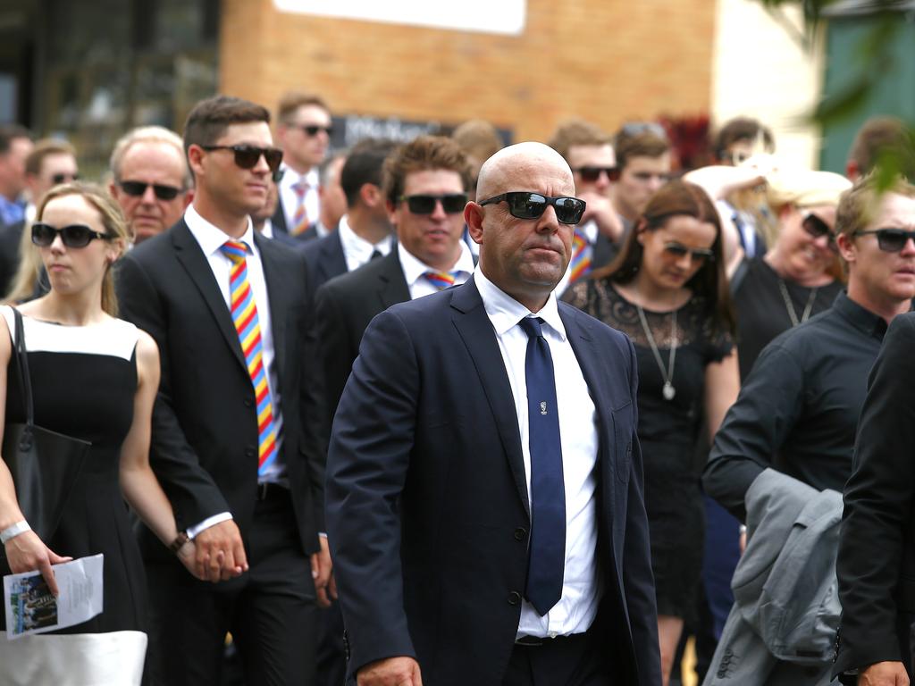 Darren Lehmann follows the procession behind Phillip Hughes at the young star’s funeral in Macksville. Picture: Bradley Hunter