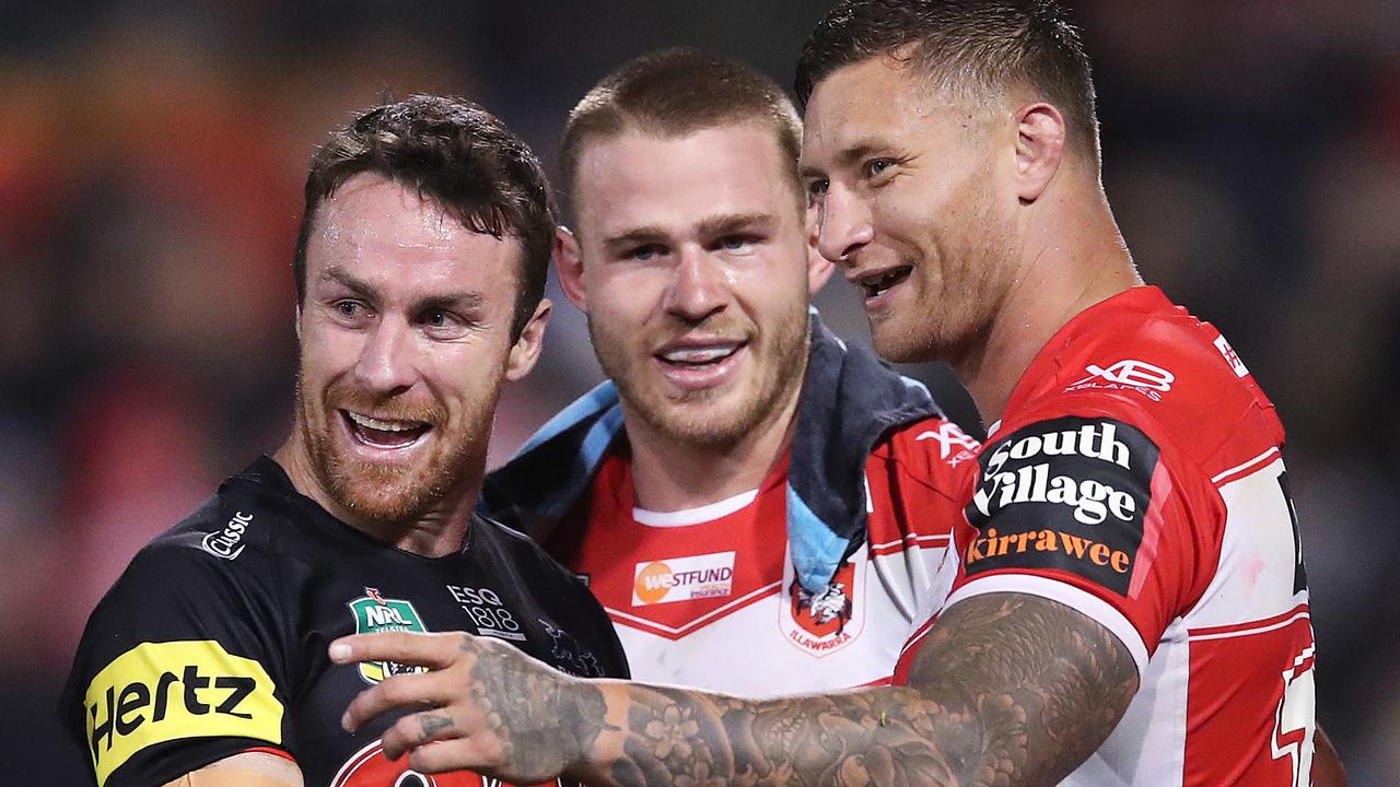 Penrith's James Maloney talks with Dragons Euan Aitken and Tariq Sims.